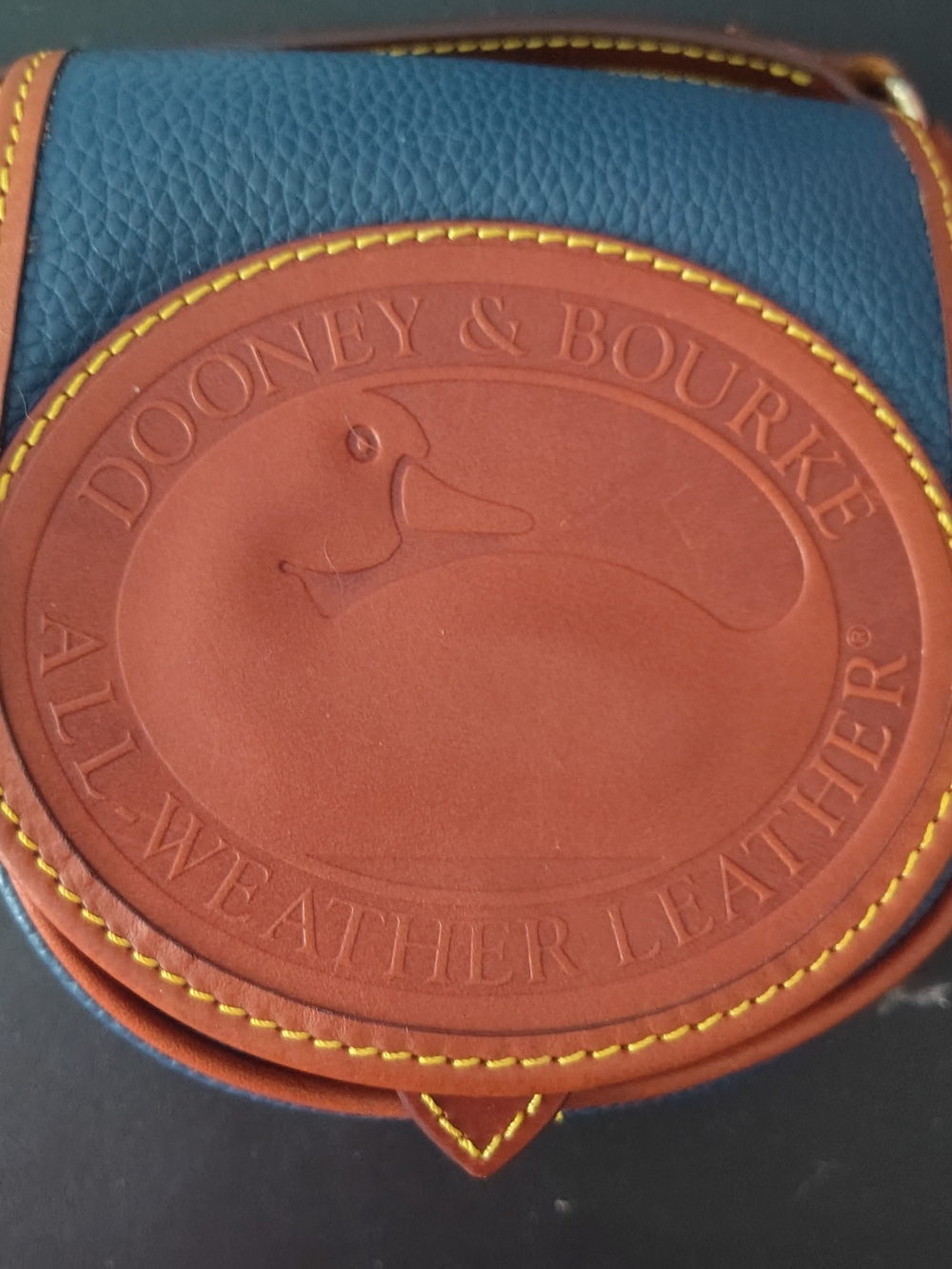 Dooney & Bourke Navy and Brown Duck Head Leather Bag